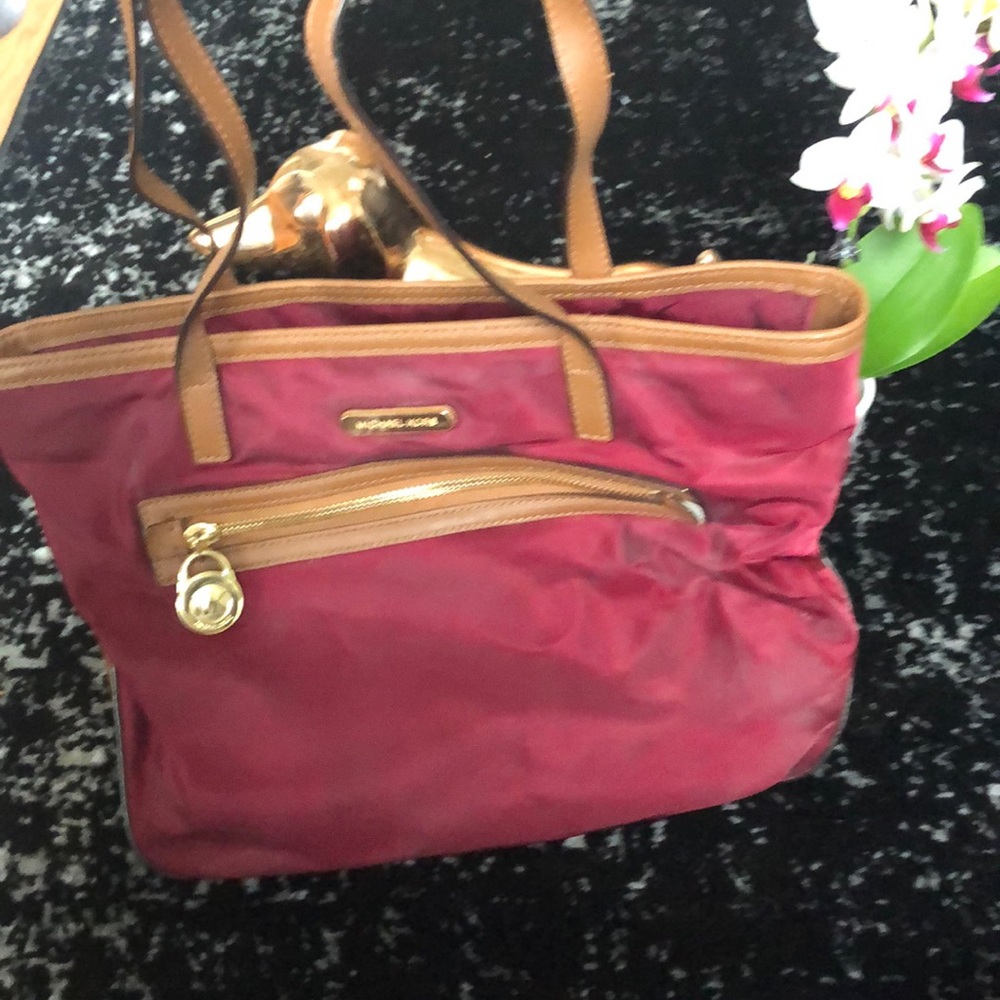 Well loved Michael Kors
Burgundy Kempton NylonTote